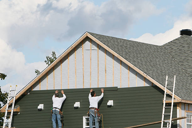 Professional Siding Installation technician working in Hastings, PA